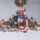 The Festive Fireside Irish Food Hamper featuring premium wines, champagne, Jameson whiskey, Christmas pudding, mince pies, Irish cheeses, Bewley’s coffee, Barry’s Tea, gourmet biscuits, preserves, luxury chocolates, and festive treats beautifully arranged with holiday decorations – available at GiftsDirect.com The Festive Fireside Irish Food Hamper featuring premium wines, champagne, Jameson whiskey, Christmas pudding, mince pies, Irish cheeses, Bewley’s coffee, Barry’s Tea, gourmet biscuits, preserves, luxury chocolates, and festive treats beautifully arranged with holiday decorations – available at GiftsDirect.com